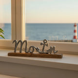 Schriftzug Moin kaufen auf Fensterbank